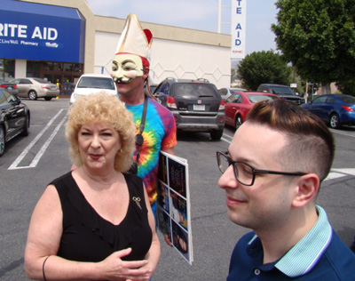 angry gay pope and protesters wait to do our thing